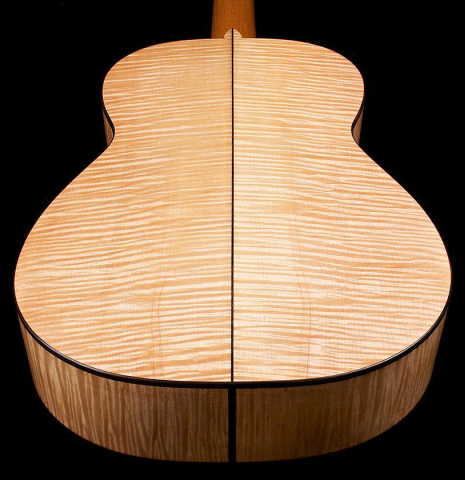 The back of a La Cañada "Model 17" classical guitar made of spruce and maple