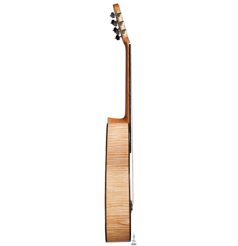 The side of a La Cañada &quot;Model 17&quot; classical guitar made of spruce and maple