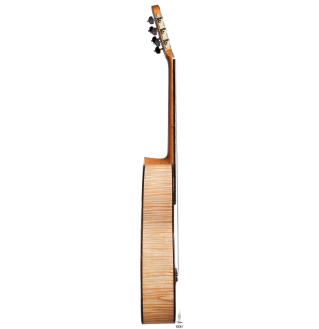 The side of a La Cañada "Model 17" classical guitar made of spruce and maple