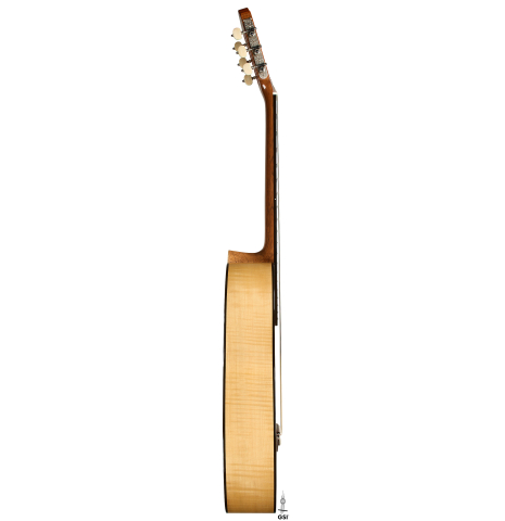 The side of a La Cañada "Model 17" classical guitar made of spruce and maple