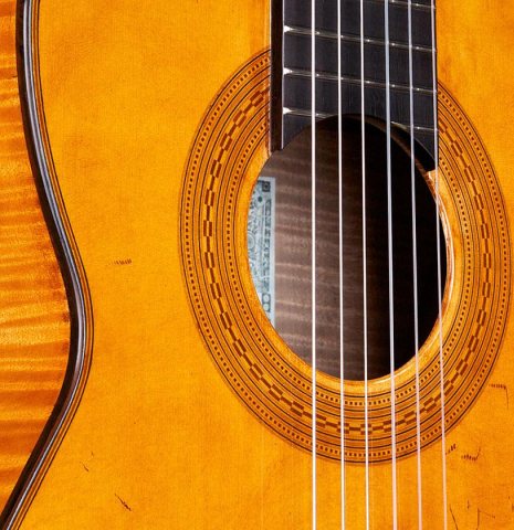 Close-up detail of the rosette of a La Cañada "Model 17A" classical guitar made of spruce and maple