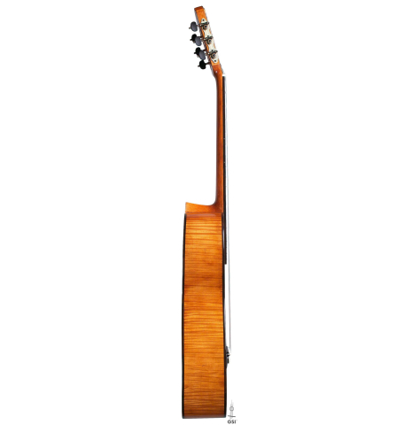 The side of a La Cañada "Model 17A" classical guitar made of spruce and maple
