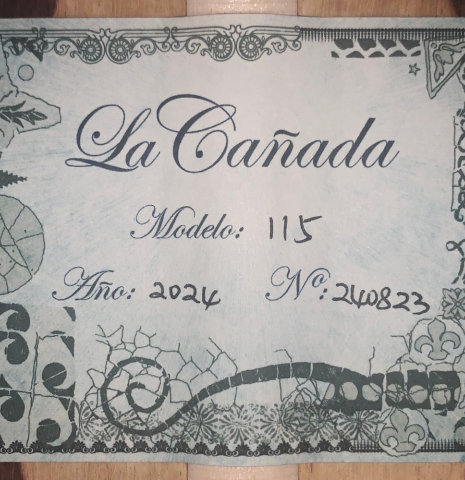 The label of a La Cañada "Model 115" classical guitar made with spruce and granadillo