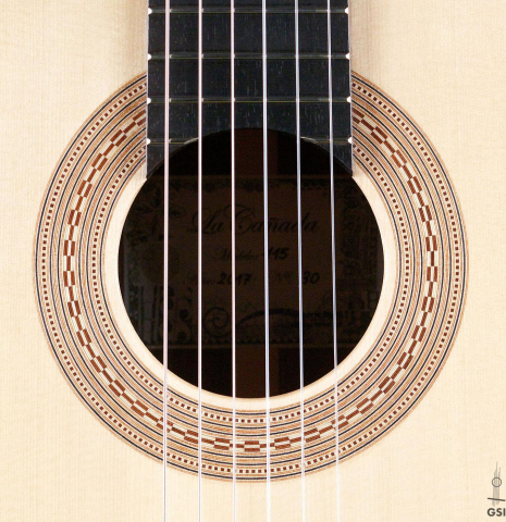 The rosette of a La Cañada &quot;Model 115&quot; classical guitar made with spruce and granadillo