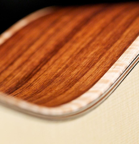 The front and side of a La Cañada "Model 115" classical guitar made with spruce and granadillo