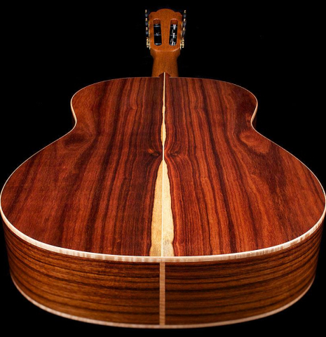 The back and sides of a La Cañada &quot;Model 115&quot; classical guitar made with spruce and granadillo