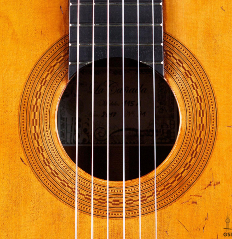 The rosette of a La Cañada &quot;Model 115A&quot; classical guitar made with spruce and granadillo