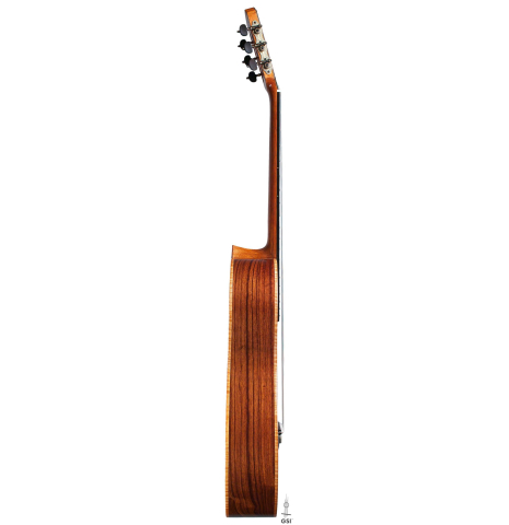 The side of a La Cañada "Model 115A" classical guitar made with spruce and granadillo
