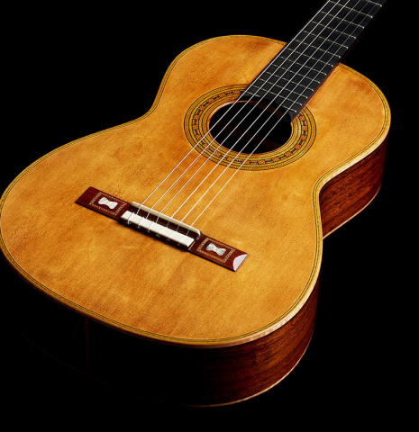 The soundboard of a La Cañada "Model 17A" classical guitar made of spruce and granadillo