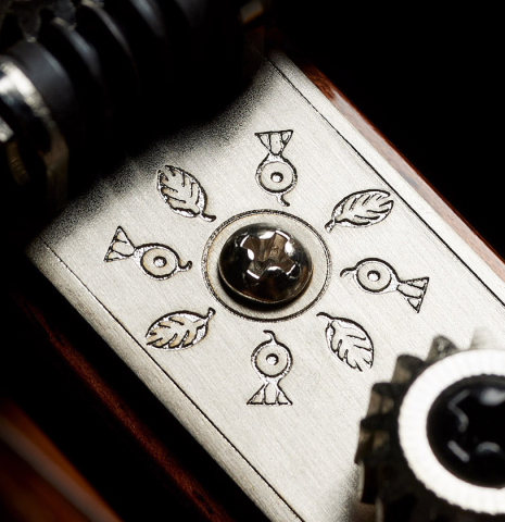 The tuning machines of a La Cañada "Model 17A" classical guitar made of spruce and granadillo