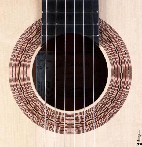 The rosette of a La Cañada &quot;Model 17&quot; classical guitar made of spruce and Granadillo 
