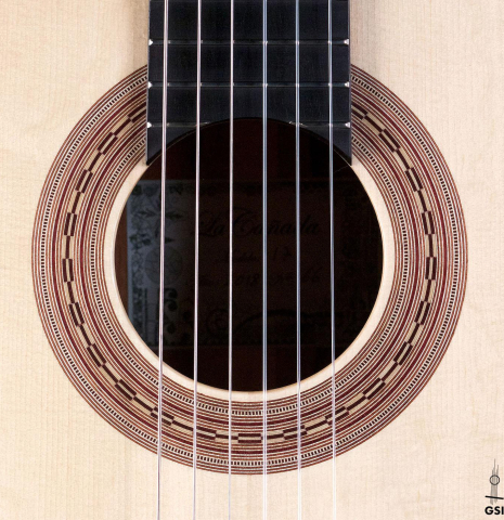 The rosette of a La Cañada "Model 17" classical guitar made of spruce and Granadillo