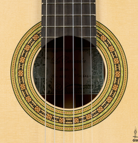 The rosette of a La Cañada "Model 17" classical guitar made of spruce and Granadillo