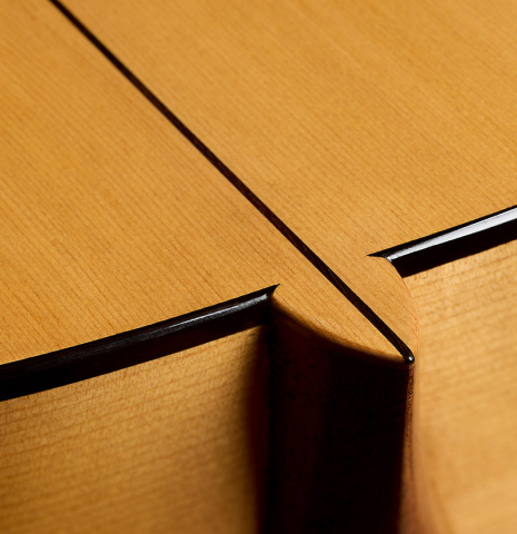 The heel, back bindin and purfling of a La Cañada "Model 17" classical guitar made of spruce and cypress