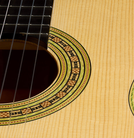The top and rosette of a La Cañada "Model 17" classical guitar made of spruce and cypress