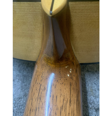 The heel of the 2025 La Cañada "Model 17" classical guitar made of spruce and cypress being auctioned