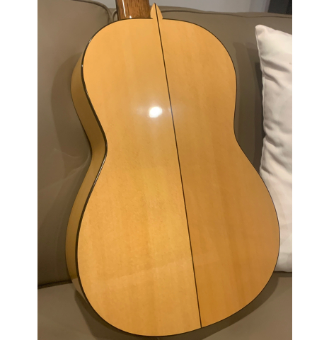 The actual back of the 2025 La Cañada "Model 17" classical guitar made of spruce and cypress being auctioned
