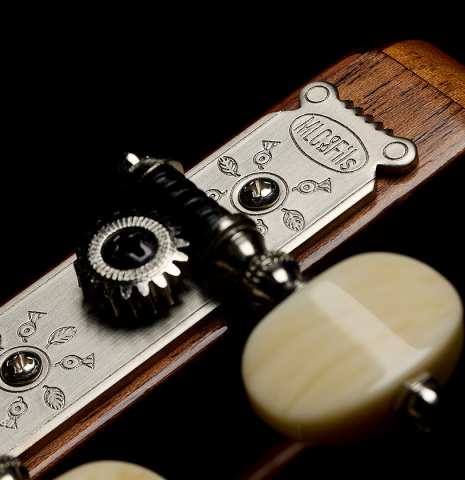 The tuning machines of a La Cañada "Model 17A" classical guitar made of spruce and cypress