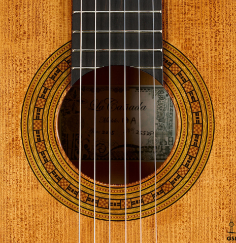 The rosette of a La Cañada "Model 17A" classical guitar made of spruce and cypress