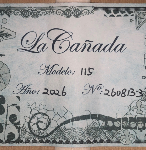 The label of a La Cañada "Model 115" classical guitar made of spruce and cypress