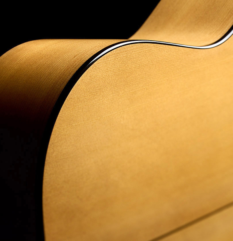 The back binding, purfling and center seam of a La Cañada "Model 115" classical guitar made of spruce and cypress
