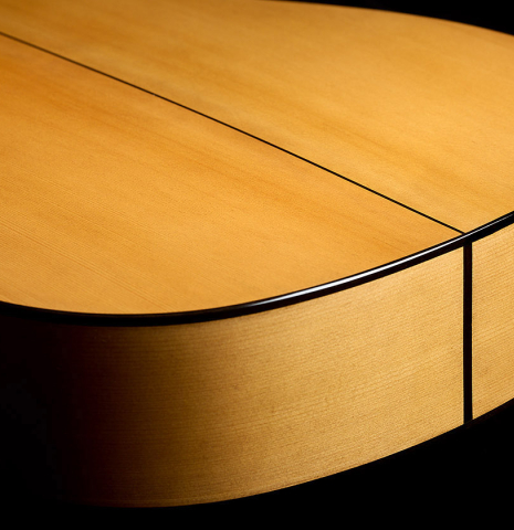 The back and sides at the foot of a La Cañada "Model 115" classical guitar made of spruce and cypress