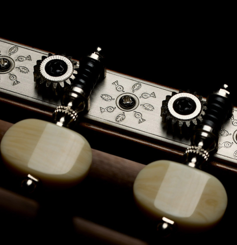 The tuning machines of a La Cañada "Model 115" classical guitar made of spruce and cypress