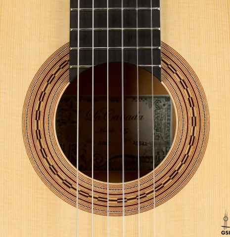 The rosette of a La Cañada "Model 115" classical guitar made of spruce and cypress