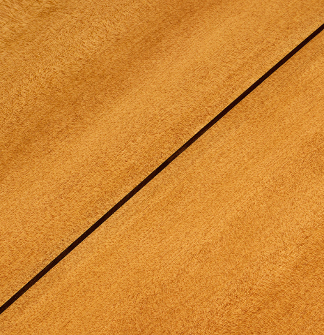The back center seam of a La Cañada "Model 115A" classical guitar made of spruce and cypress