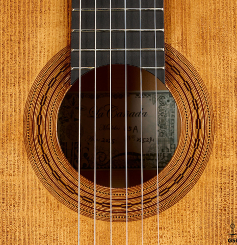 The rosette of a La Cañada "Model 115A" classical guitar made of spruce and cypress
