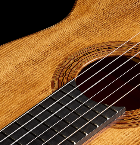 The soundboard and rosette of a La Cañada "Model 115A" classical guitar made of spruce and cypress