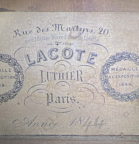 The label of a c. 1845-1875 French Romantic guitar “1844 Lacôte” classical guitar made of spruce and pear wood
