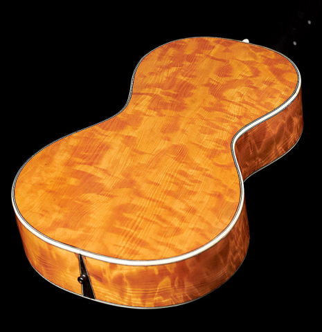 The back and sides of a c. 1845-1875 French Romantic guitar “1844 Lacôte” classical guitar made of spruce and pear wood