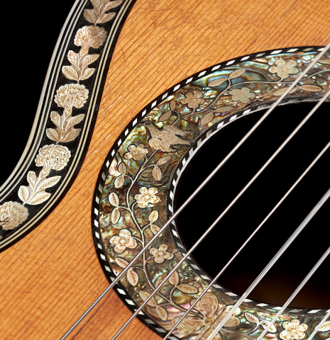 The top and inlay detail of a c. 1845-1875 French Romantic guitar “1844 Lacôte” classical guitar made of spruce and pear wood
