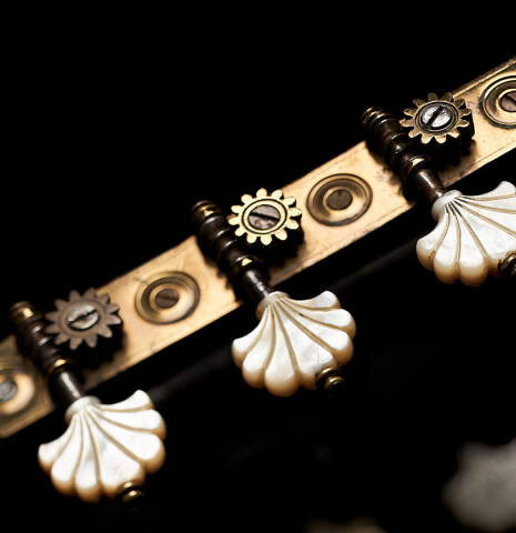 The tuning machines of a c. 1845-1875 French Romantic guitar “1844 Lacôte” classical guitar made of spruce and pear wood