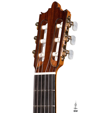 The headstock of a 2022 Paula Lazzarini classical guitar made of cedar and Indian rosewood
