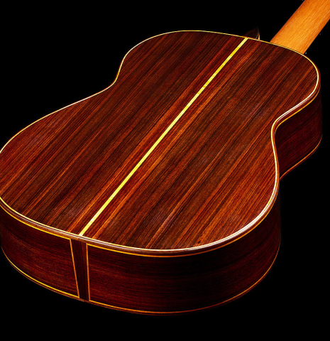 The back and sides of a 2025 Paula Lazzarini classical guitar made of cedar and Indian rosewood