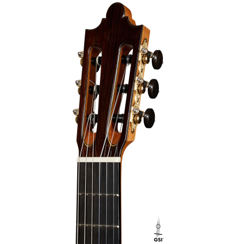 The headstock of a 2025 Paula Lazzarini classical guitar made of cedar and Indian rosewood