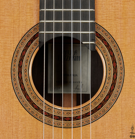 The rosette of a 2025 Paula Lazzarini classical guitar made of cedar and Indian rosewood