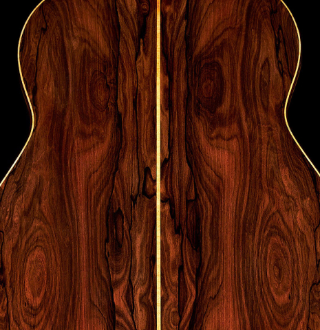 The back and center seam of a 2023 Paula Lazzarini classical guitar made of cedar and ziricote