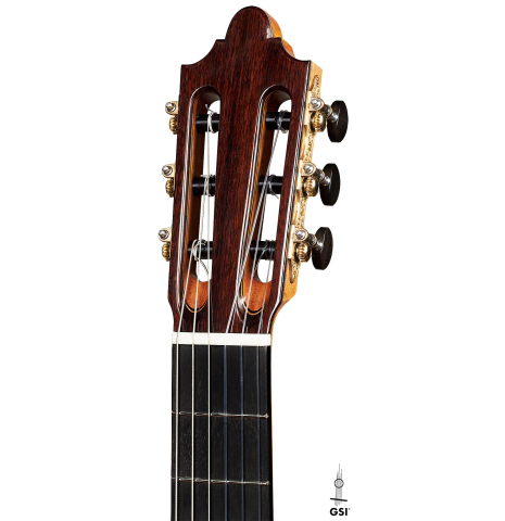 The headstock of a 2023 Paula Lazzarini classical guitar made of cedar and ziricote