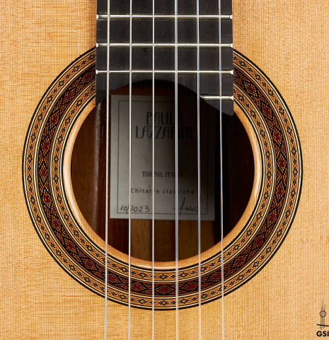 The rosette of a 2023 Paula Lazzarini classical guitar made of cedar and cocobolo