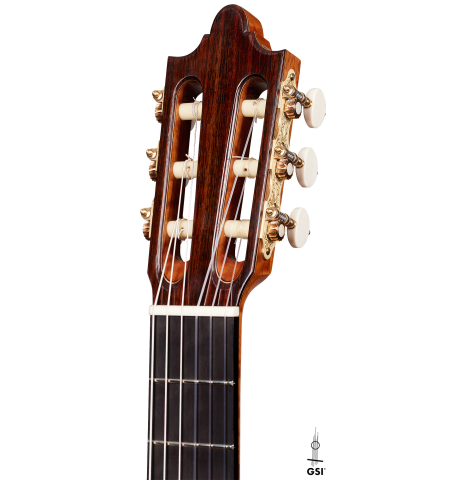 The headstock of a 2024 Paula Lazzarini "Roma Guitar Expo" classical guitar made of cedar and cocobolo