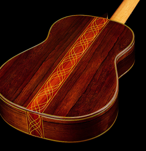 The back and sides of a 2025 Paula Lazzarini "Limited Edition - REG 2025" classical guitar made of spruce and African rosewood