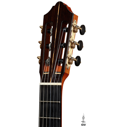 The headstock of a 2014 Garrett Lee classical guitar made of spruce and CSA rosewood