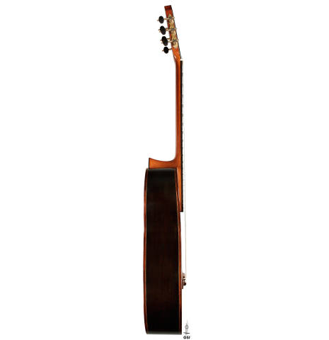 The side of a 2014 Garrett Lee classical guitar made of spruce and CSA rosewood