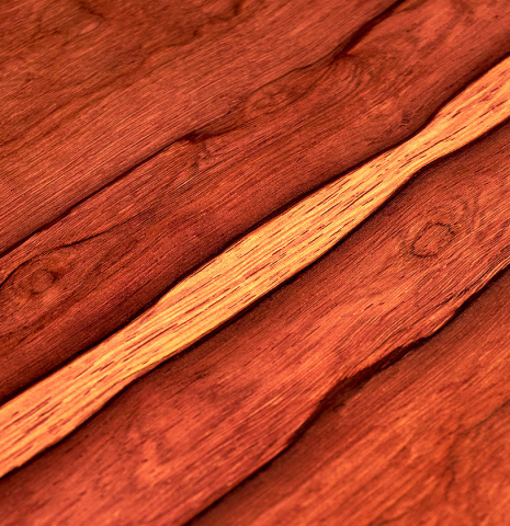 The back of a 2022 Francois Leonard classical guitar made of cedar and African rosewood