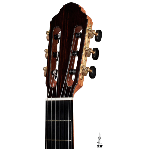 The headstock of a 2022 Francois Leonard classical guitar made of spruce and African rosewood