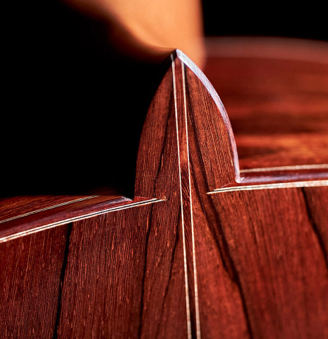 The heel of a 2022 Francois Leonard classical guitar made of spruce and African rosewood