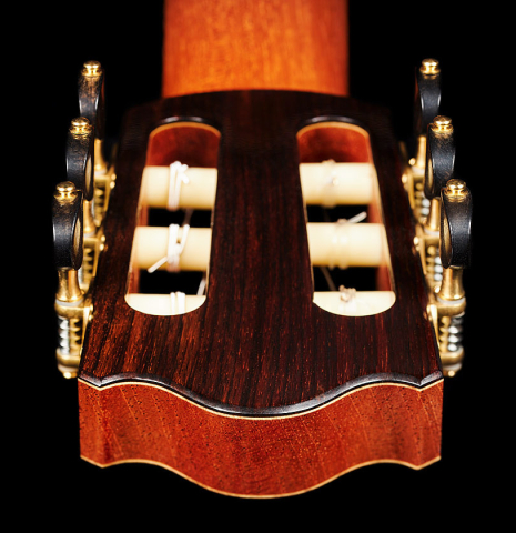 The back headstock veneer of a 2024 Valerio Licari "Albayzín" classical guitar made of cedar and Indian rosewood